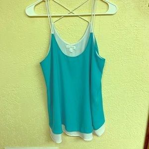 Teal and white criss cross tank